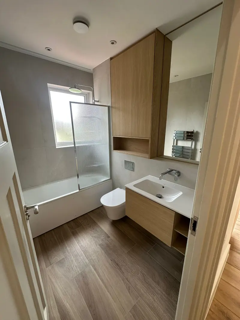 Bathroom renovation with oak vanity unit in Esher Surrey