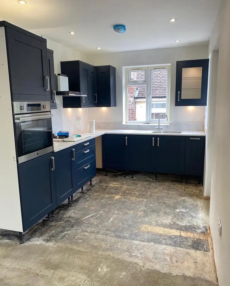 Navy blue shaker kitchen installation in Kingston Surrey